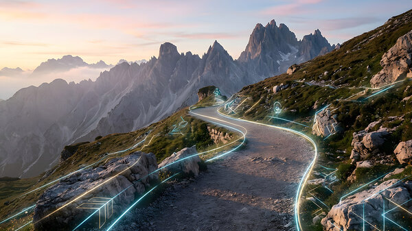 Digitale Routenführung als Overlay auf einer kurvenreichen Bergstraße bei Sonnenuntergang, das die Navigation mit erweiterter Realität, die Datenkonnektivität und den technologischen Fortschritt in abgelegenen Landschaften veranschaulicht.